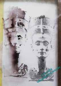 An experiment with acrylic ink on gauze, producing a face of Nefertiti