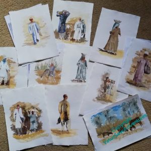 A cluster of half finished watercolours of basket children and labourers from EES digs