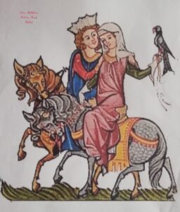 Marginal picture from a medieval manuscript, showing a man and woman on horseback, the woman with a falcon on her wrist