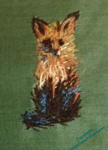 Intermediate stage of the fox, blue for white in shadow, lots of dark brown. Unfortunately a slightly blurred photo.