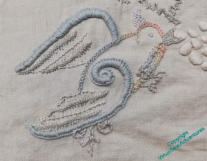 Close up of Bitey Bird, who tends towards blue shades, as he was first finished.
