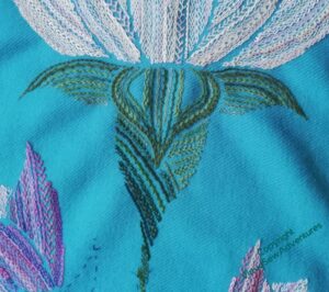 Calyx of the main, white flower on the Lotus Flower Coat