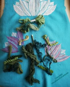 Back piece of the Lotus Flower Coat, scattered with green embroidery wool