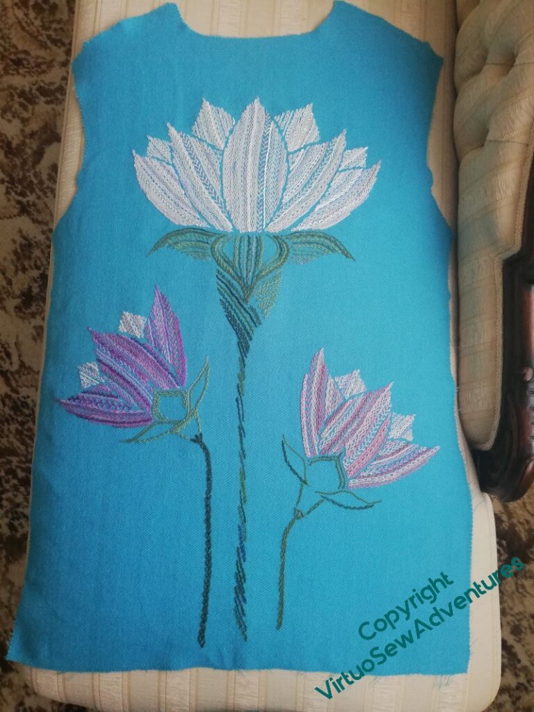 Back of the Lotus Flower coat, finished and pressed, and lying on a settee