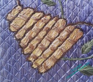 Finished first skep, with a second layer of stitching emulating strapping holding the layers together.